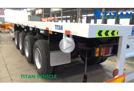 Trailer phẳng với tường phía trước